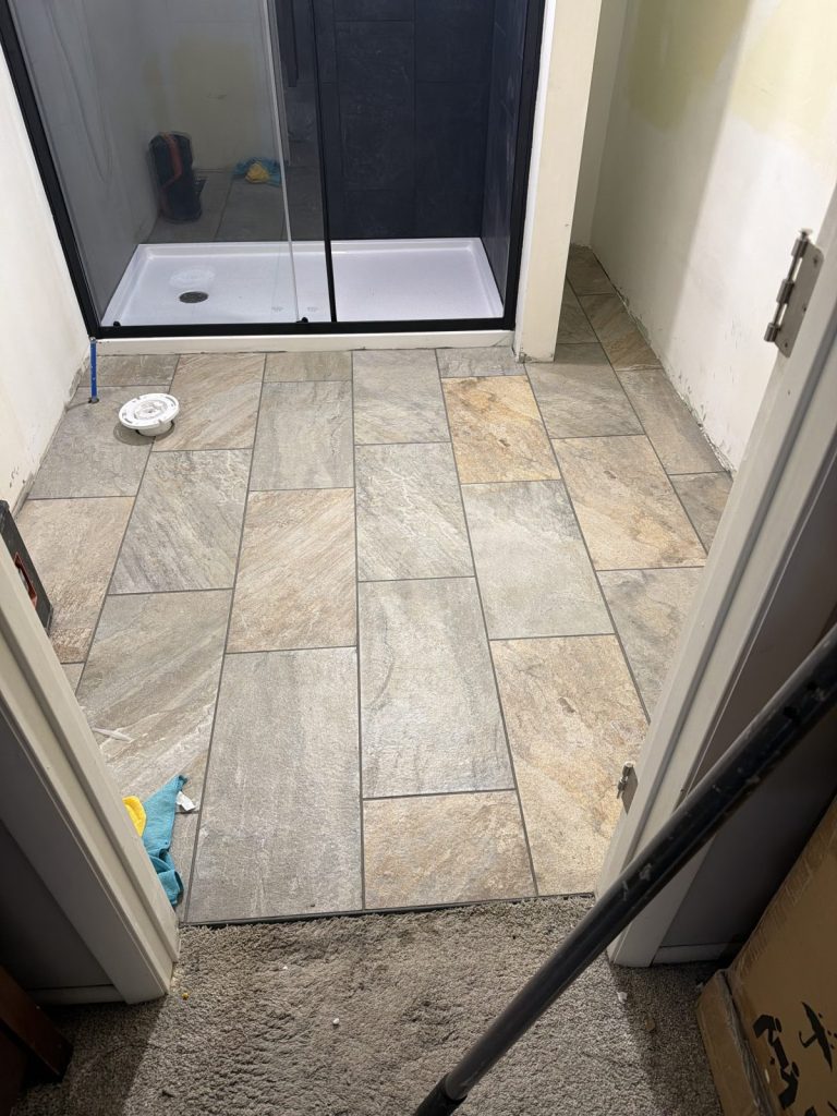 Bathroom tile work during a home job